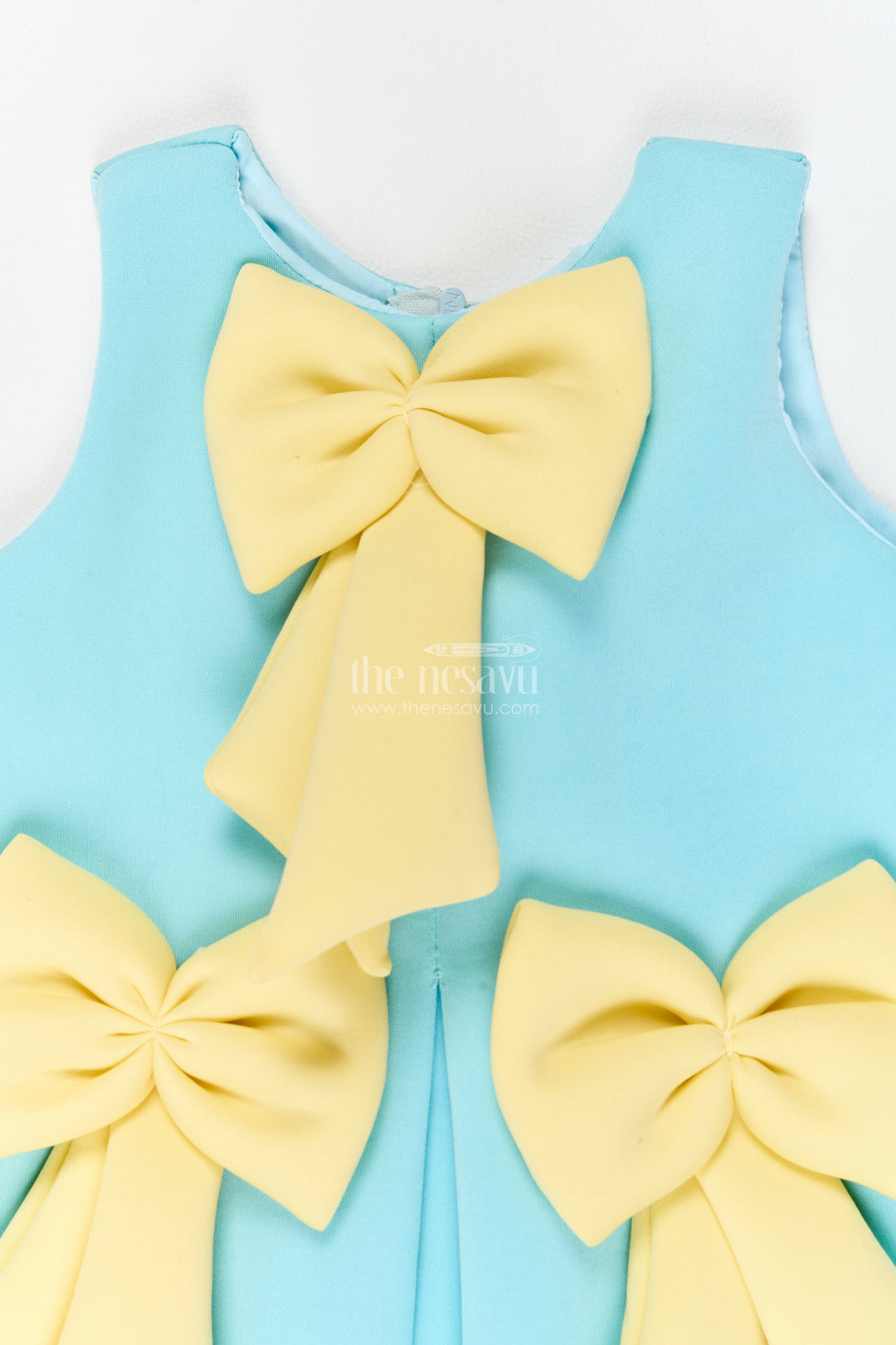 Girls Turquoise Scuba Sculptural Yellow Bows Party Frock