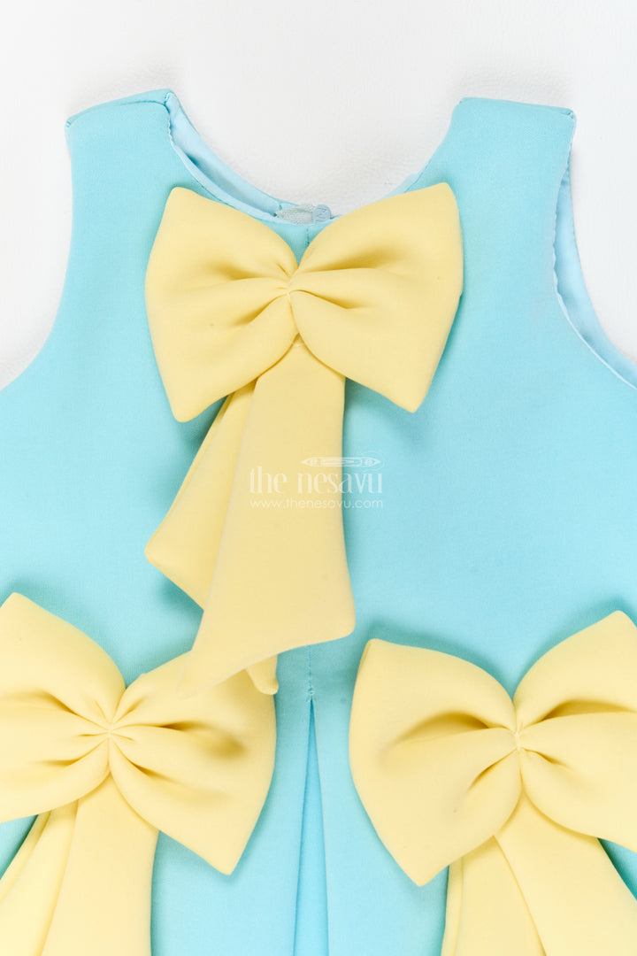 Girls Turquoise Scuba Sculptural Yellow Bows Party Frock