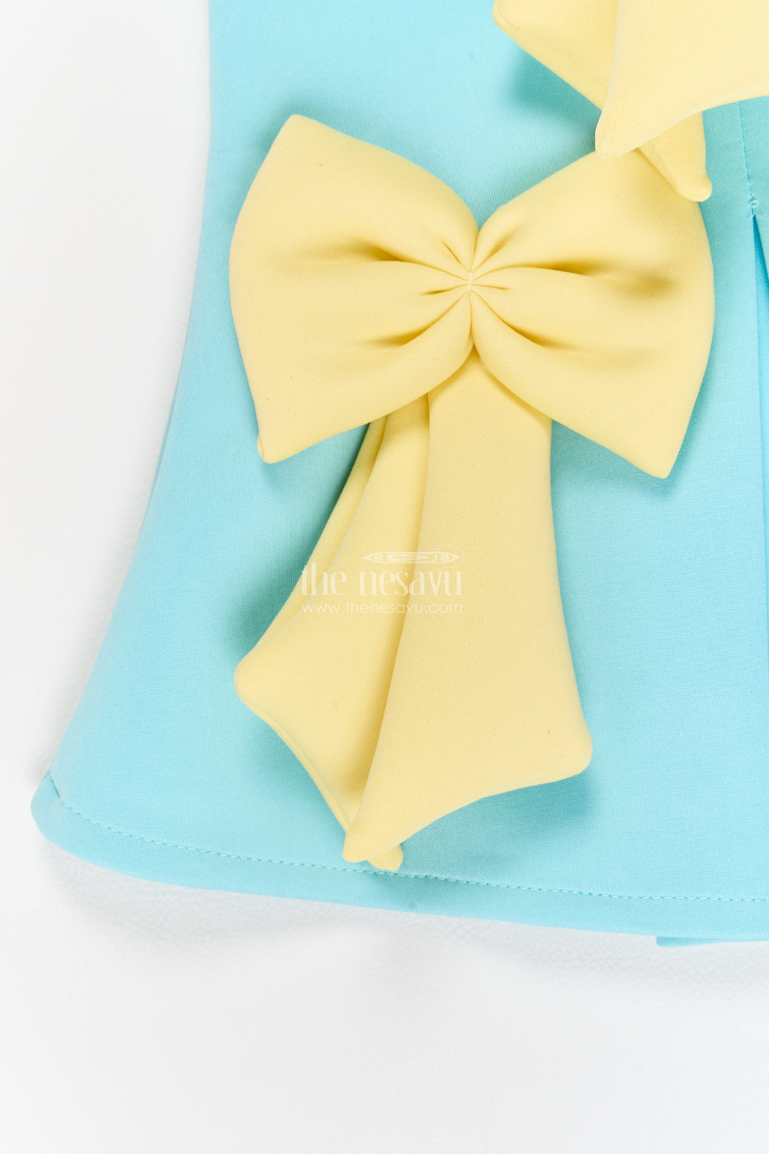 Girls Turquoise Scuba Sculptural Yellow Bows Party Frock