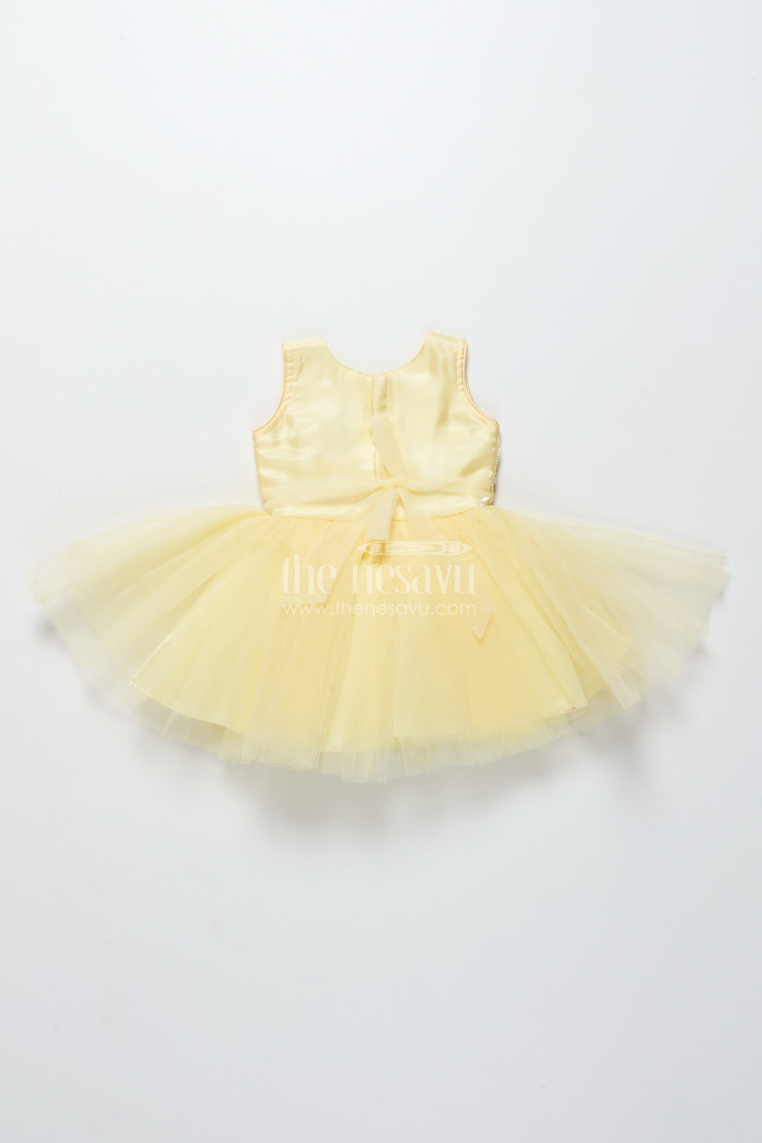 Baby girl party frock with beaded yoke and fluffy net skirt