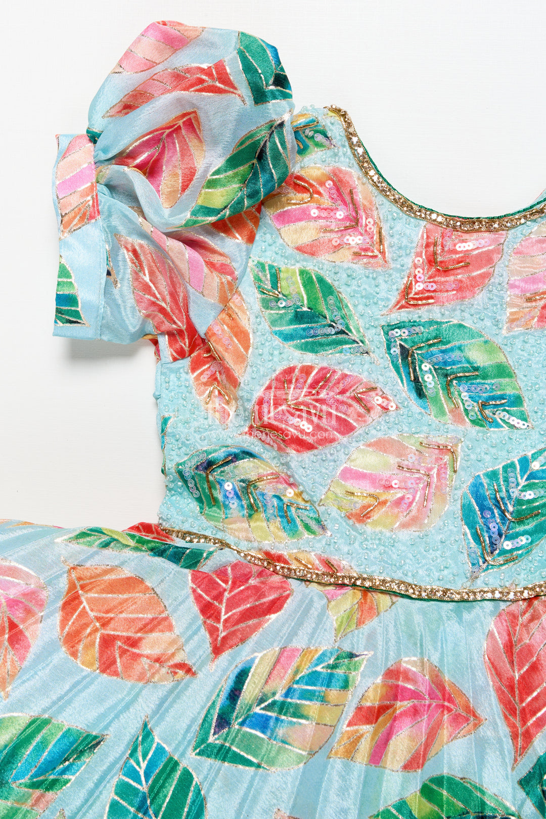 Girls silk party frock with beads and leafy digital print