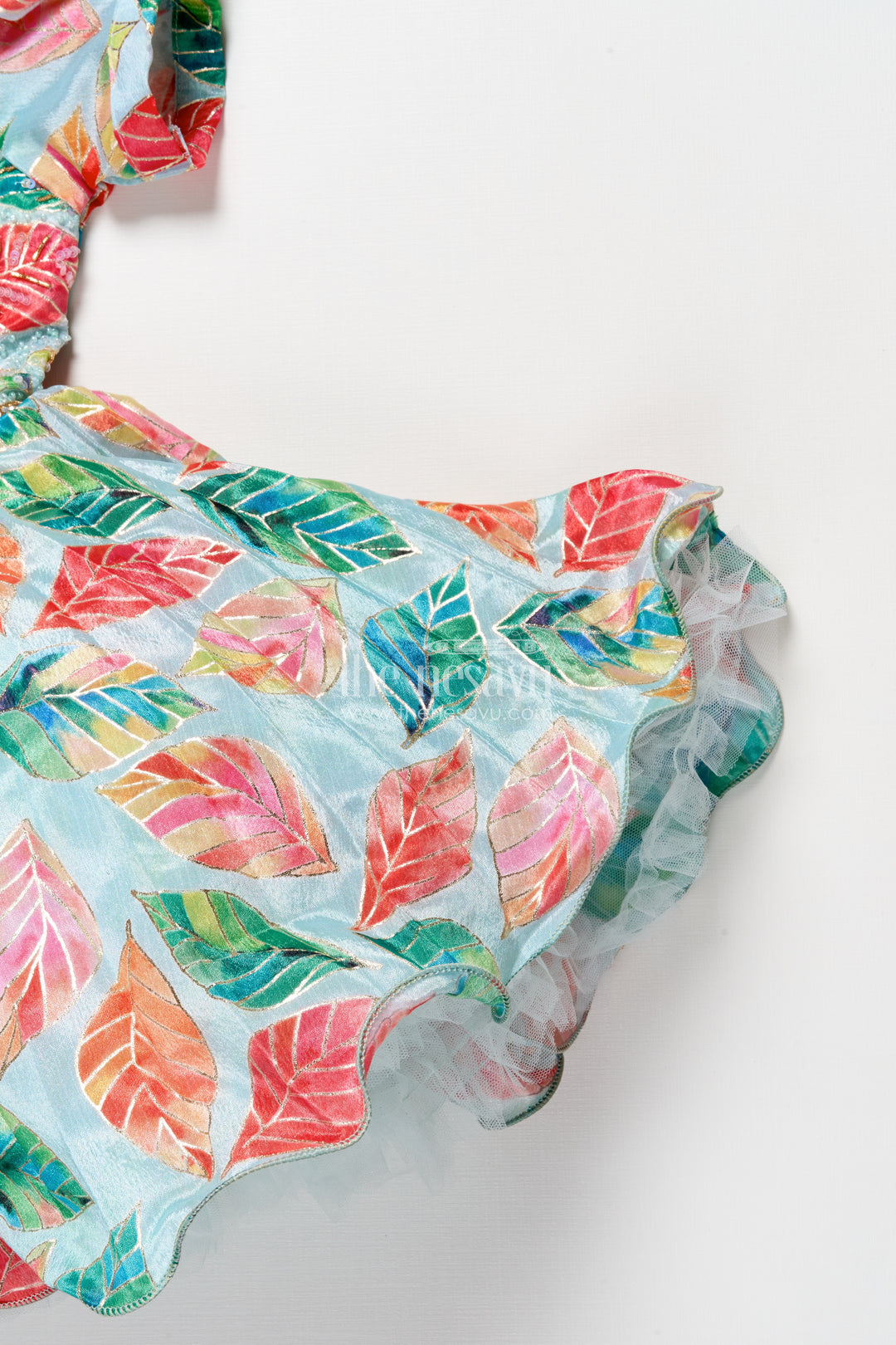 Girls silk party frock with beads and leafy digital print