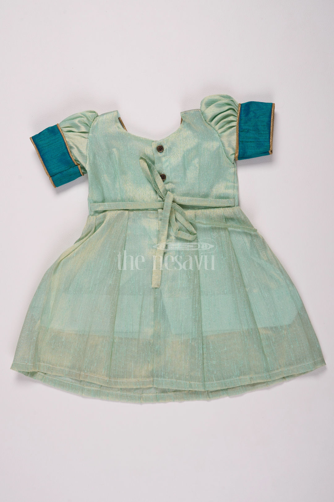 Graceful Light Green Silk Frock Dress for Girls with Elegant Silver Tissue Fabric