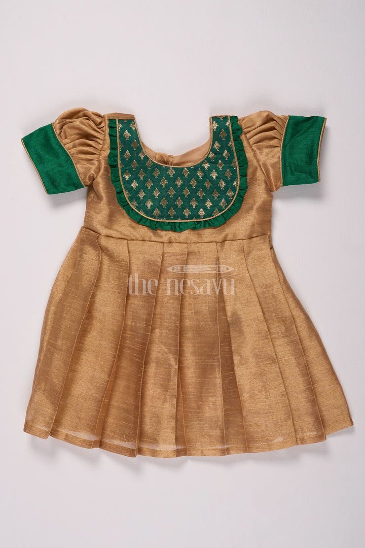 Radiant Gold Long Frock Pattu for Girls with Green Bib Yoke and Silver Tissue Fabric