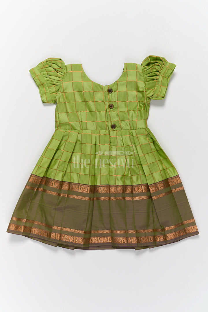 Vibrant Green Pattu Long Frock for Girls with Golden Checkered Pattern and Ruffled Yoke