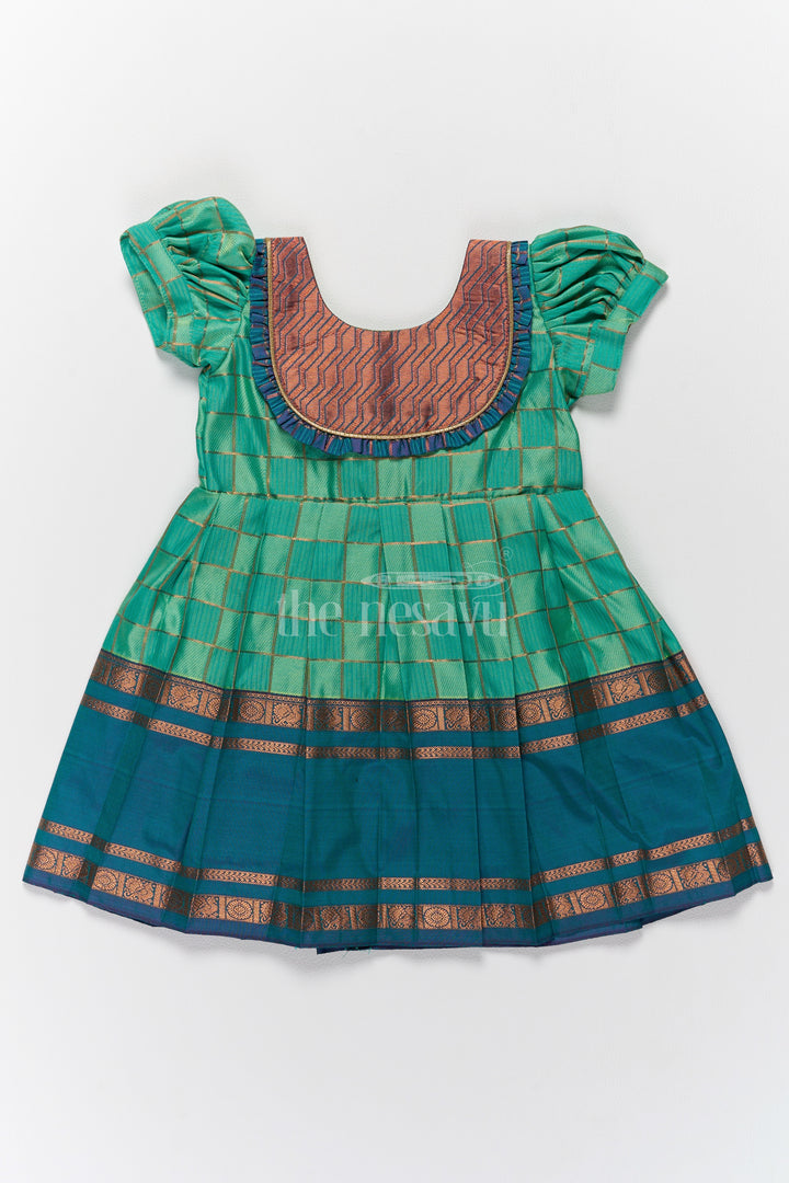 Vibrant Green Pattu Long Frock for Girls with Golden Checkered Pattern and Ruffled Yoke