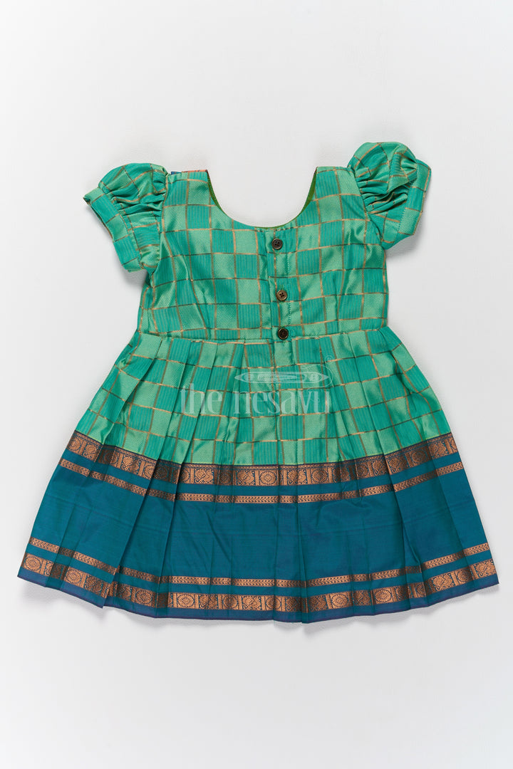 Vibrant Green Pattu Long Frock for Girls with Golden Checkered Pattern and Ruffled Yoke