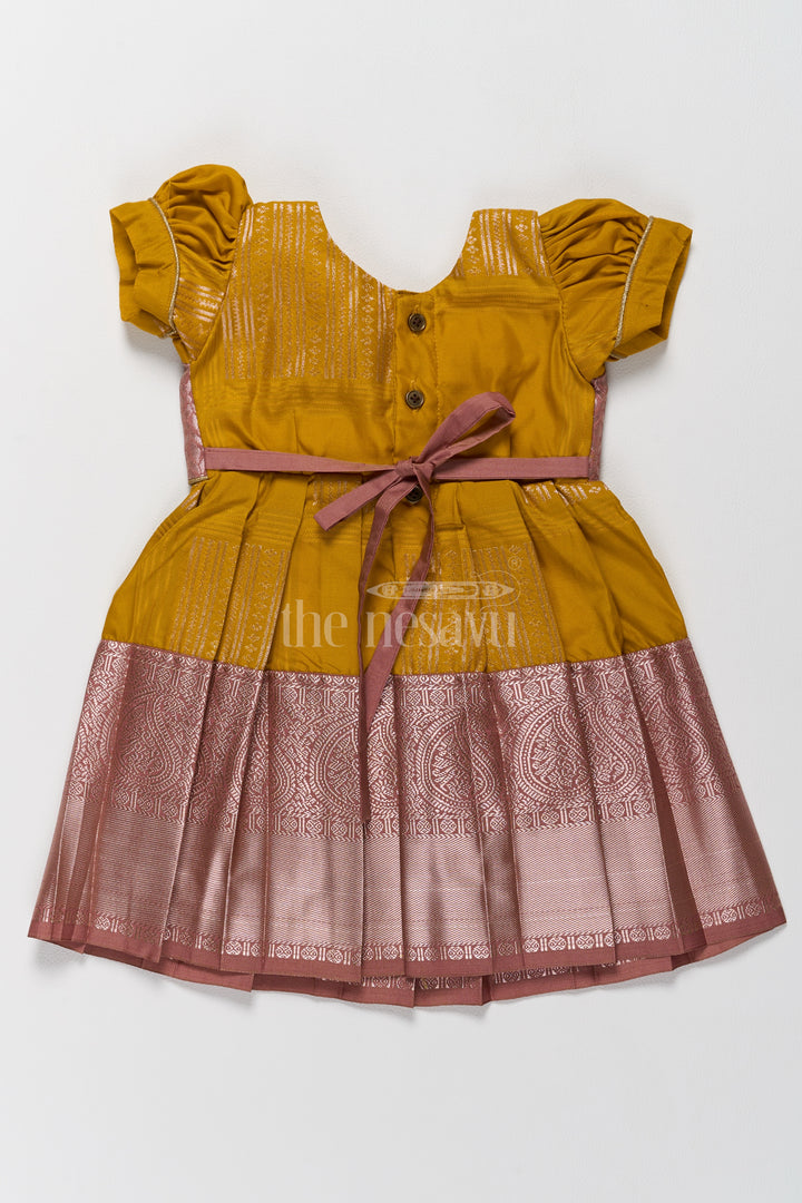 Charming Yellow and Brown Girls Kanchi Silk Frock with Traditional Brocade for Pongal