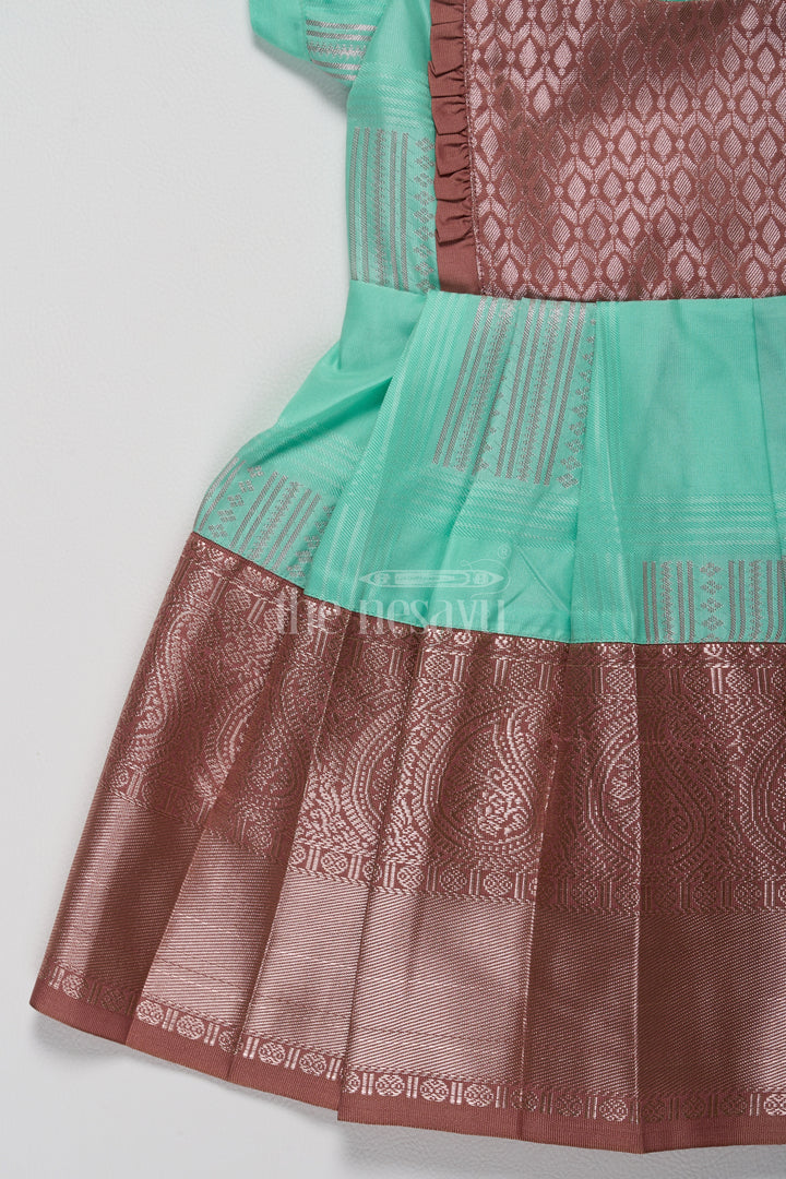 Elegant Mint Green Pattu Frock Design for Girls with Bronze Yoke in Blend Silk