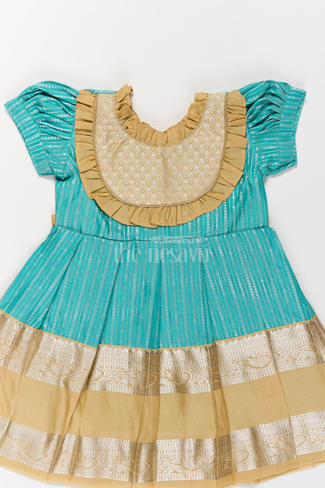 Regal Green and Gold Kanchi Silk Frock with Elegant Festive Appeal