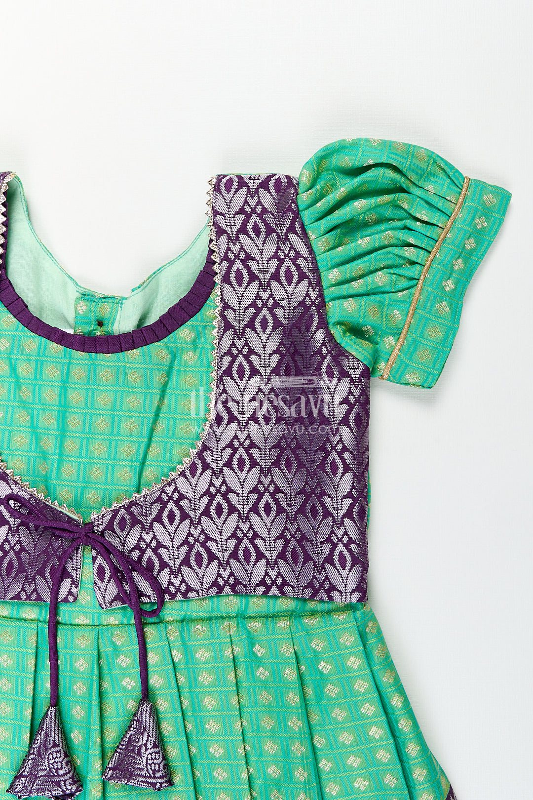Girls Kanchivaram Silk Cotton Frocks with Puff Sleeves Green Bodice and Purple Zari Woven Skirt