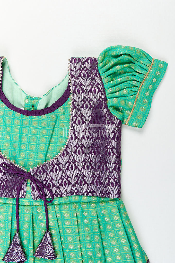 Girls Kanchivaram Silk Cotton Frocks with Puff Sleeves Green Bodice and Purple Zari Woven Skirt