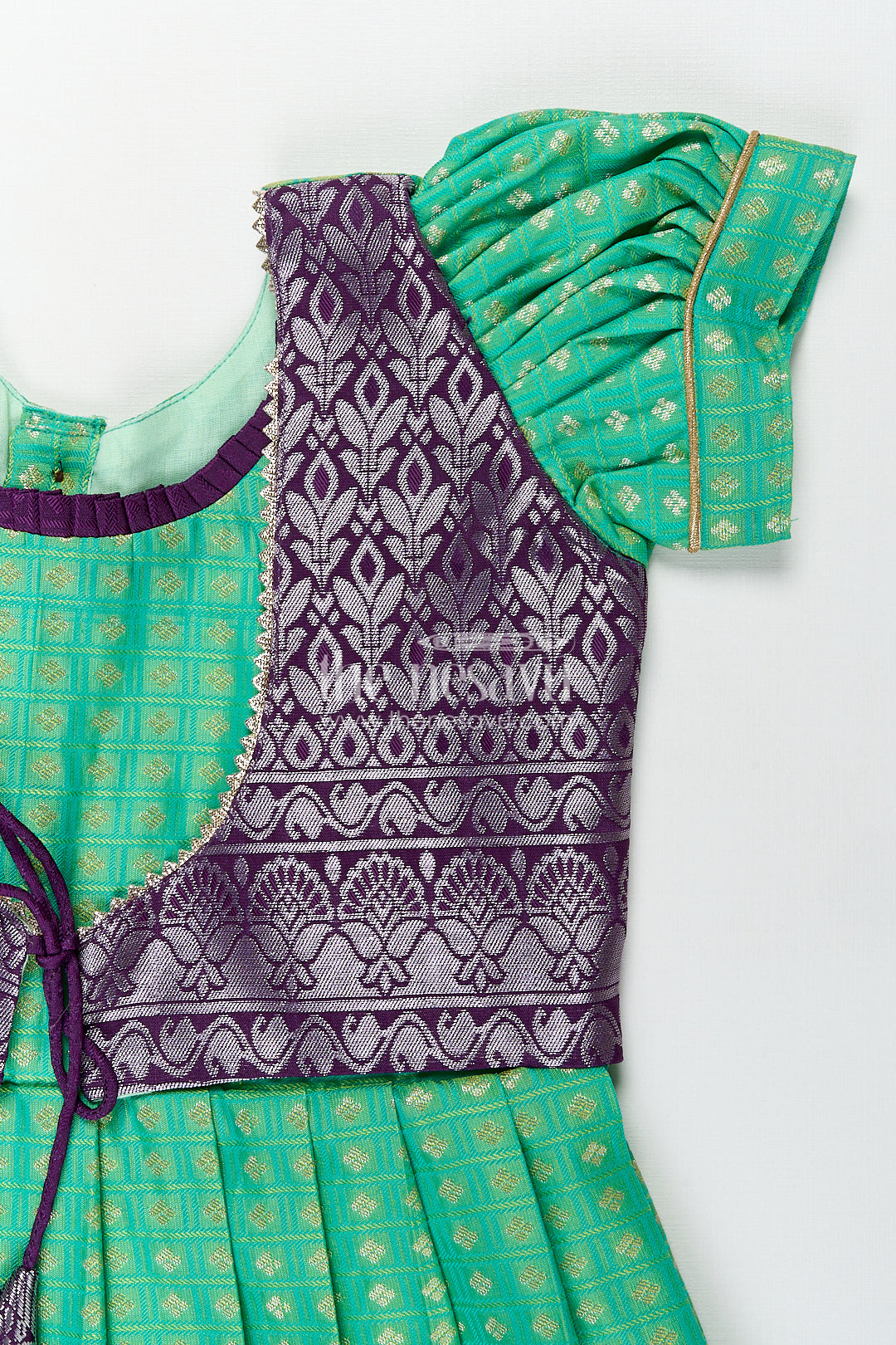 Girls Kanchivaram Silk Cotton Frocks with Puff Sleeves Green Bodice and Purple Zari Woven Skirt