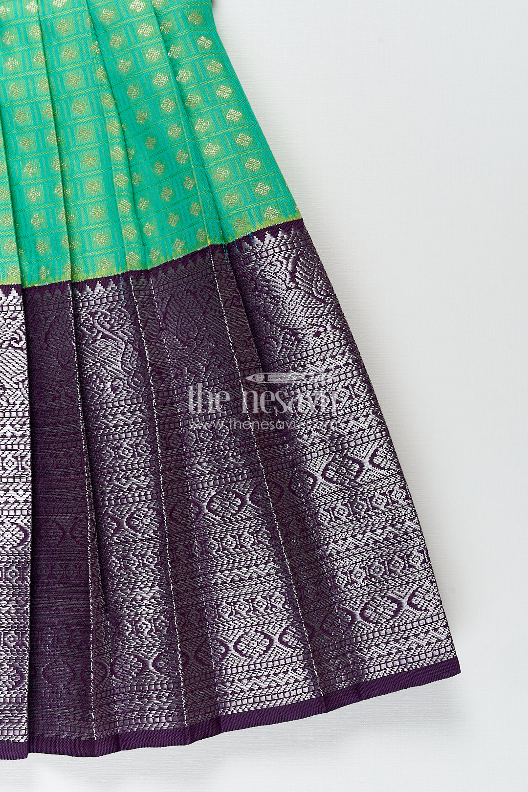 Girls Kanchivaram Silk Cotton Frocks with Puff Sleeves Green Bodice and Purple Zari Woven Skirt