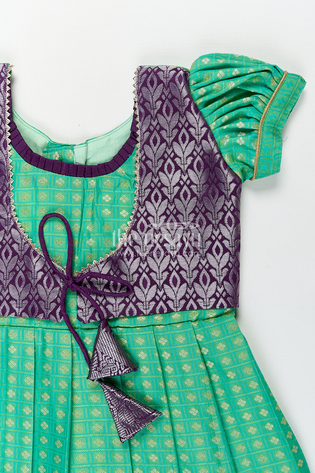 Girls Kanchivaram Silk Cotton Frocks with Puff Sleeves Green Bodice and Purple Zari Woven Skirt
