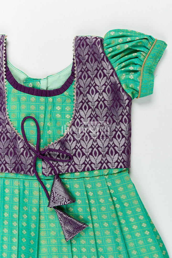 Girls Kanchivaram Silk Cotton Frocks with Puff Sleeves Green Bodice and Purple Zari Woven Skirt