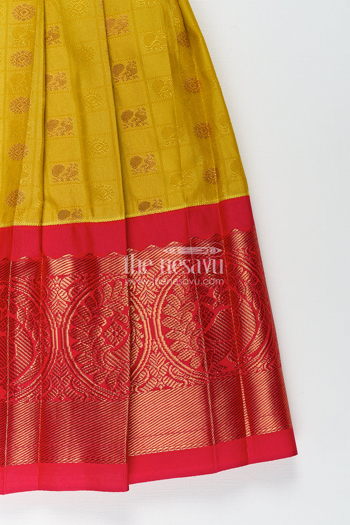 Girls Kanchivaram Yellow Silk Frock with Puff Sleeves and Contrast Maroon Zari Woven Border Design