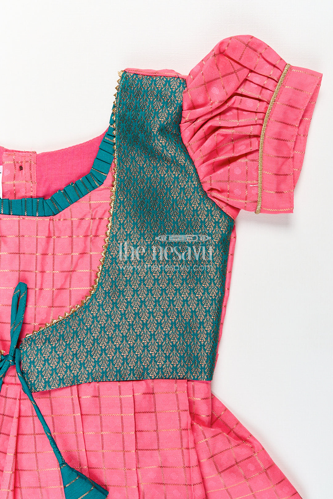 Girls Kanchivaram Pink Silk Dress with Puff Sleeves and Green Zari Overlay for Traditional Celebrations