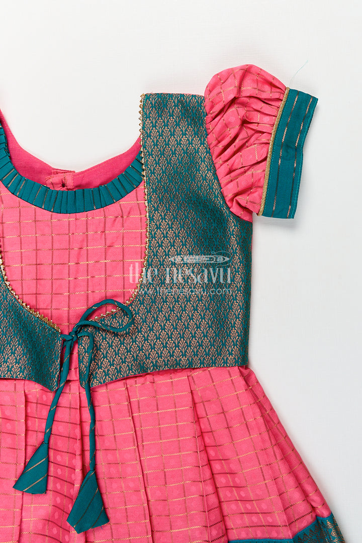 Girls Kanchivaram Pink Silk Dress with Puff Sleeves and Green Zari Overlay for Traditional Celebrations