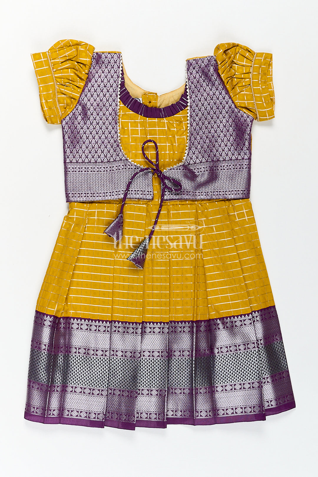 Girls Kanchivaram Traditional Dress Frock in Mustard Yellow with Puff Sleeves and Purple Zari Border