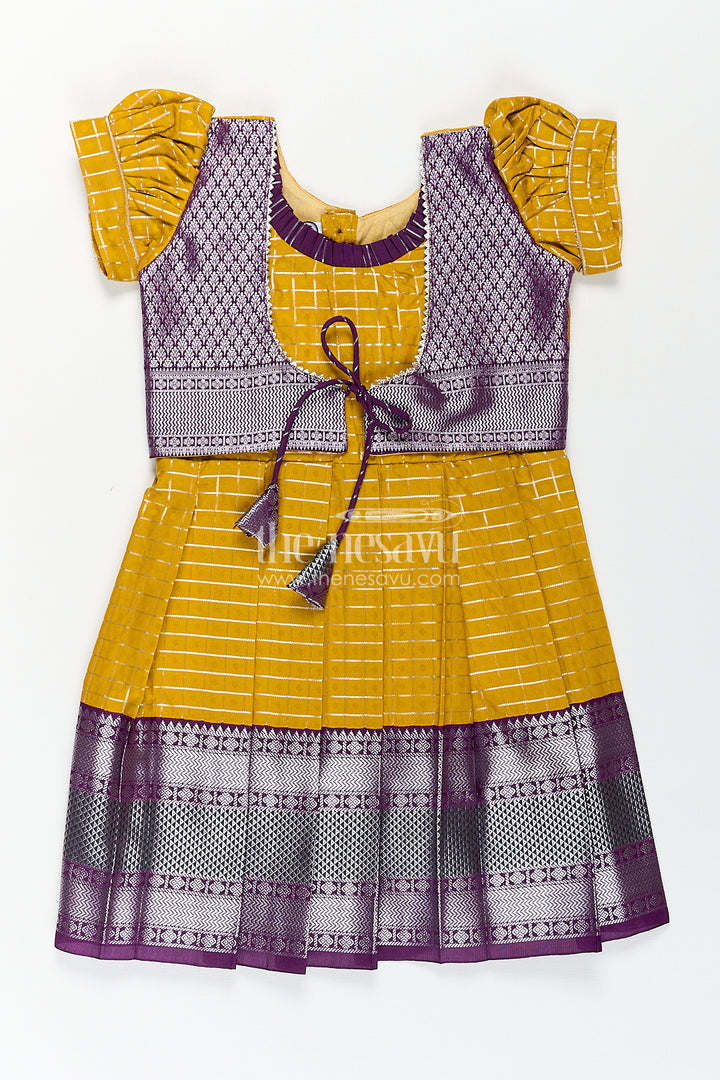 Girls Kanchivaram Traditional Dress Frock in Mustard Yellow with Puff Sleeves and Purple Zari Border