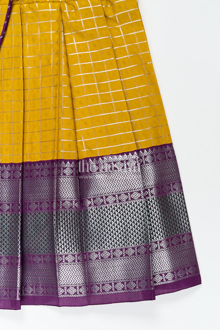 Girls Kanchivaram Traditional Dress Frock in Mustard Yellow with Puff Sleeves and Purple Zari Border