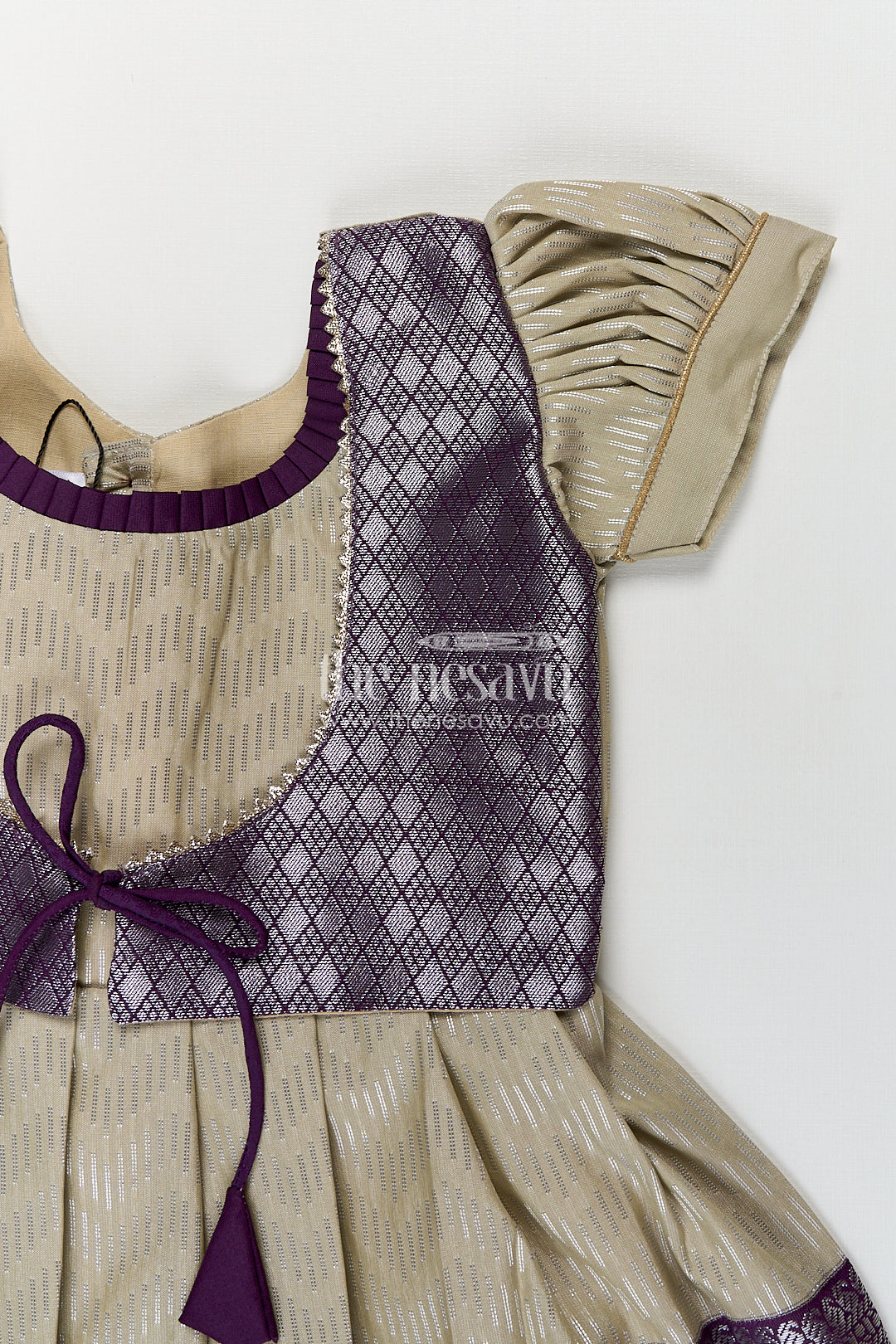 Girls Kanchivaram Frock Traditional in Cream and Purple with Puff Sleeves and Zari Woven Border