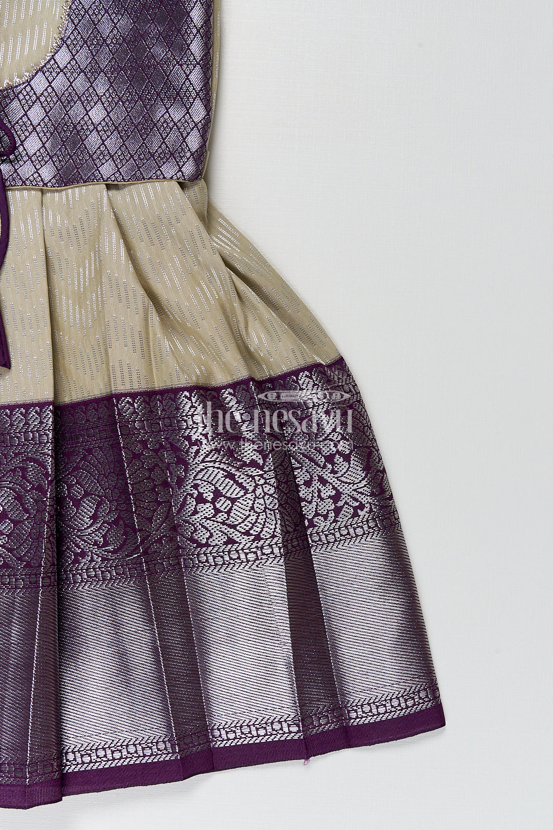 Girls Kanchivaram Frock Traditional in Cream and Purple with Puff Sleeves and Zari Woven Border
