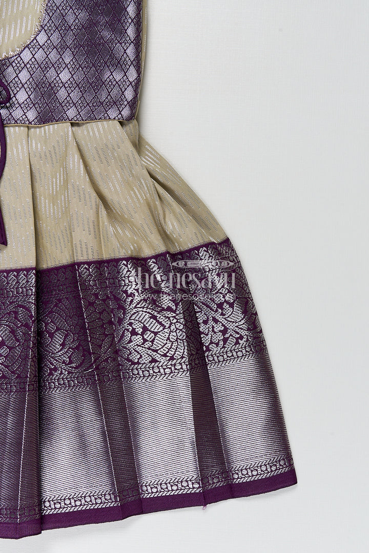 Girls Kanchivaram Frock Traditional in Cream and Purple with Puff Sleeves and Zari Woven Border