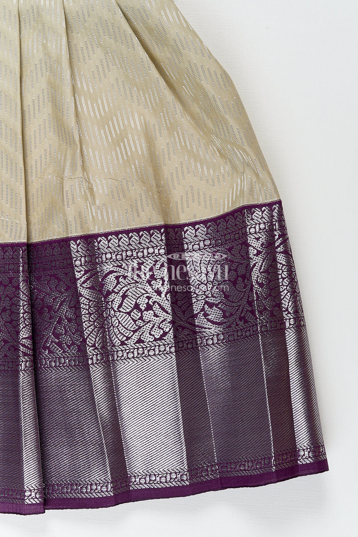 Girls Kanchivaram Frock Traditional in Cream and Purple with Puff Sleeves and Zari Woven Border