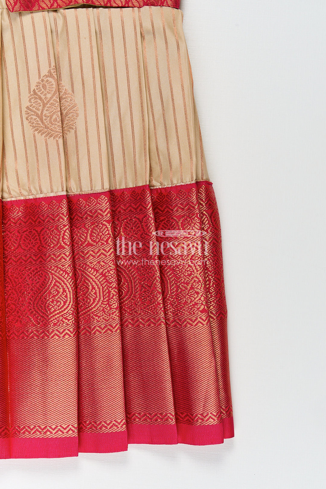 Girls Kanchivaram Frock Design with Silk Saree Style in Cream and Red with Puff Sleeves and Zari Border
