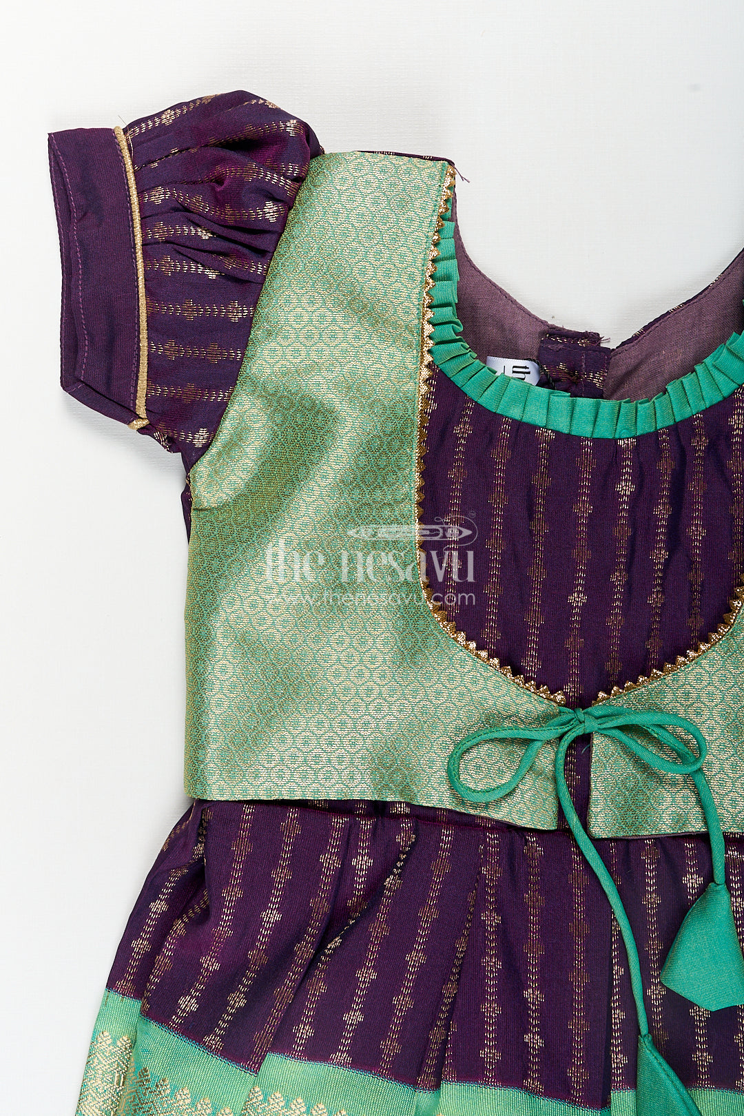 Girls Kanchivaram Long Green Frock with Puff Sleeves in Purple and Zari Woven Skirt and Overlay Detail