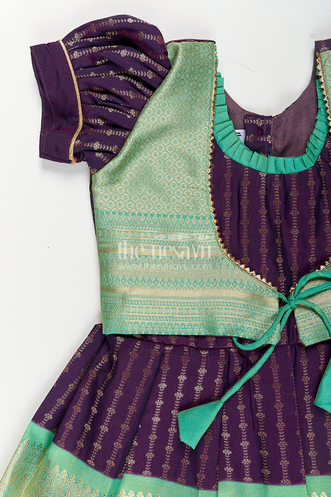 Girls Kanchivaram Long Green Frock with Puff Sleeves in Purple and Zari Woven Skirt and Overlay Detail
