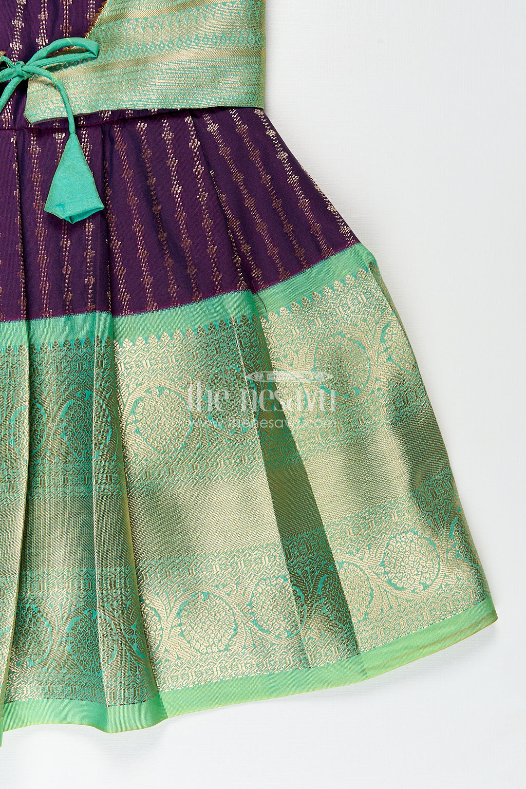 Girls Kanchivaram Long Green Frock with Puff Sleeves in Purple and Zari Woven Skirt and Overlay Detail