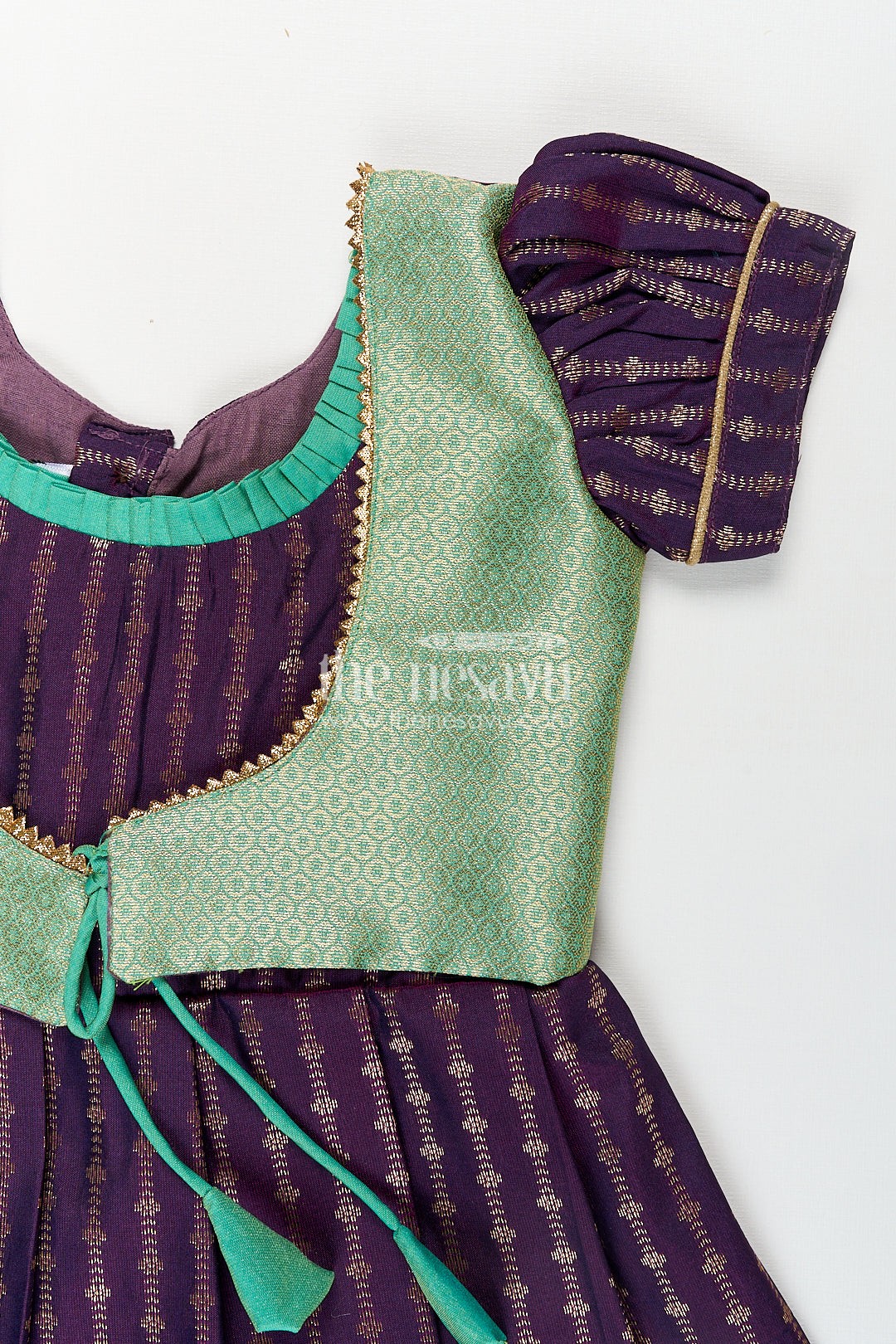 Girls Kanchivaram Long Green Frock with Puff Sleeves in Purple and Zari Woven Skirt and Overlay Detail