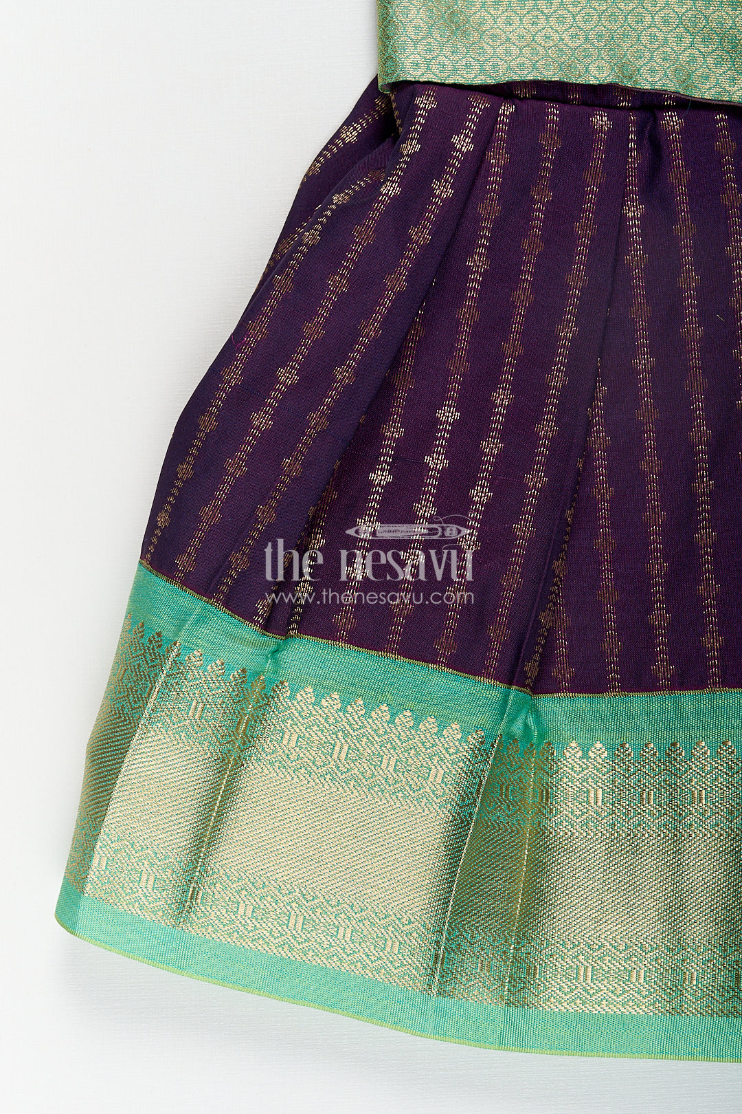 Girls Kanchivaram Long Green Frock with Puff Sleeves in Purple and Zari Woven Skirt and Overlay Detail