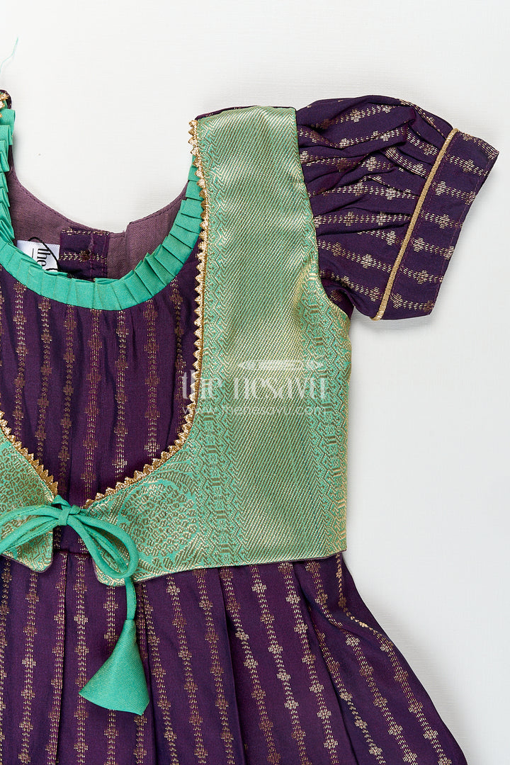 Girls Kanchivaram Long Green Frock with Puff Sleeves in Purple and Zari Woven Skirt and Overlay Detail