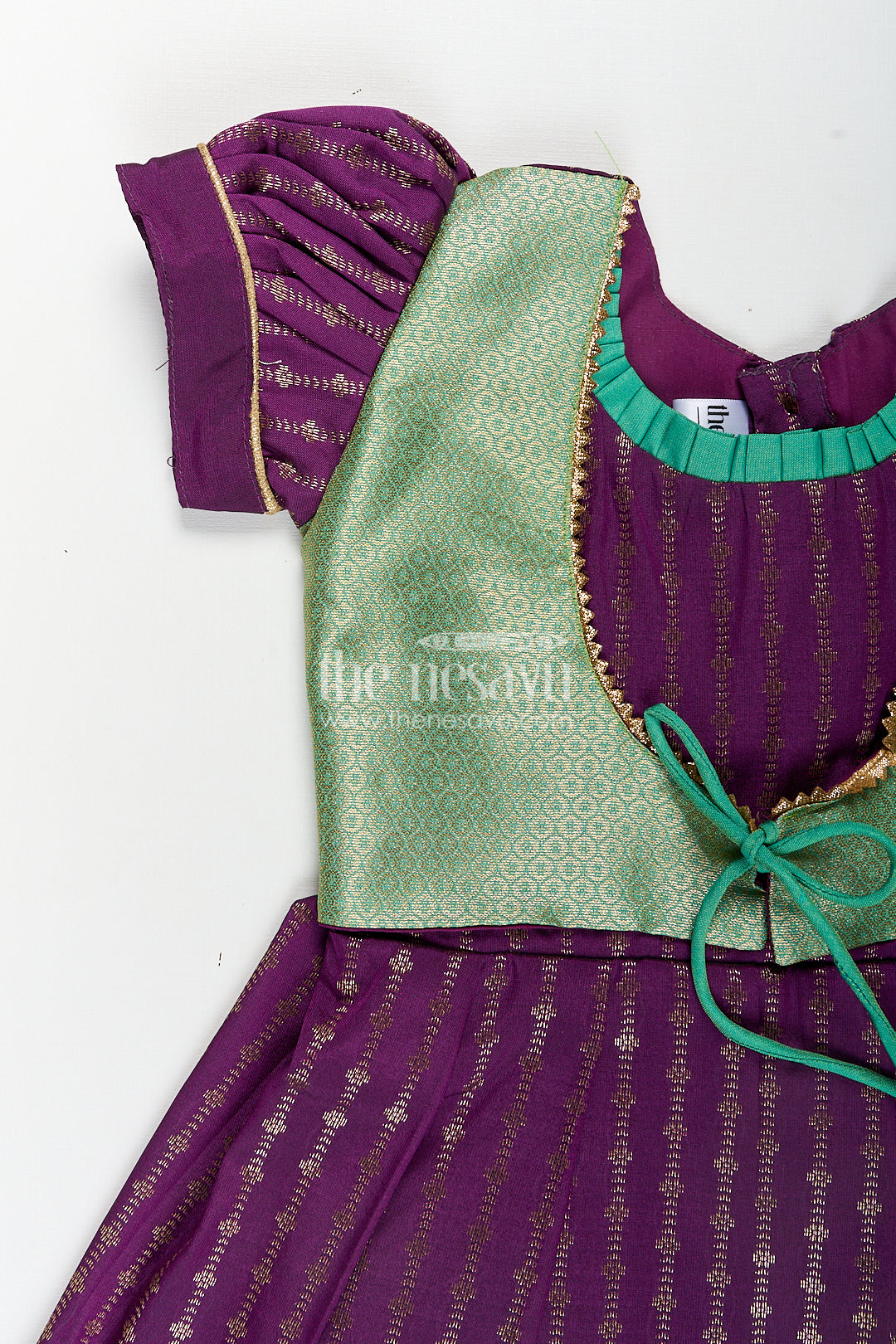 Girls Kanchivaram Long Green Frock with Puff Sleeves in Purple and Zari Woven Skirt and Overlay Detail