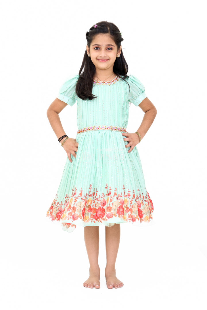 Mint Green Girls Fancy Frock with Floral Embellishments and Vibrant Border for Parties