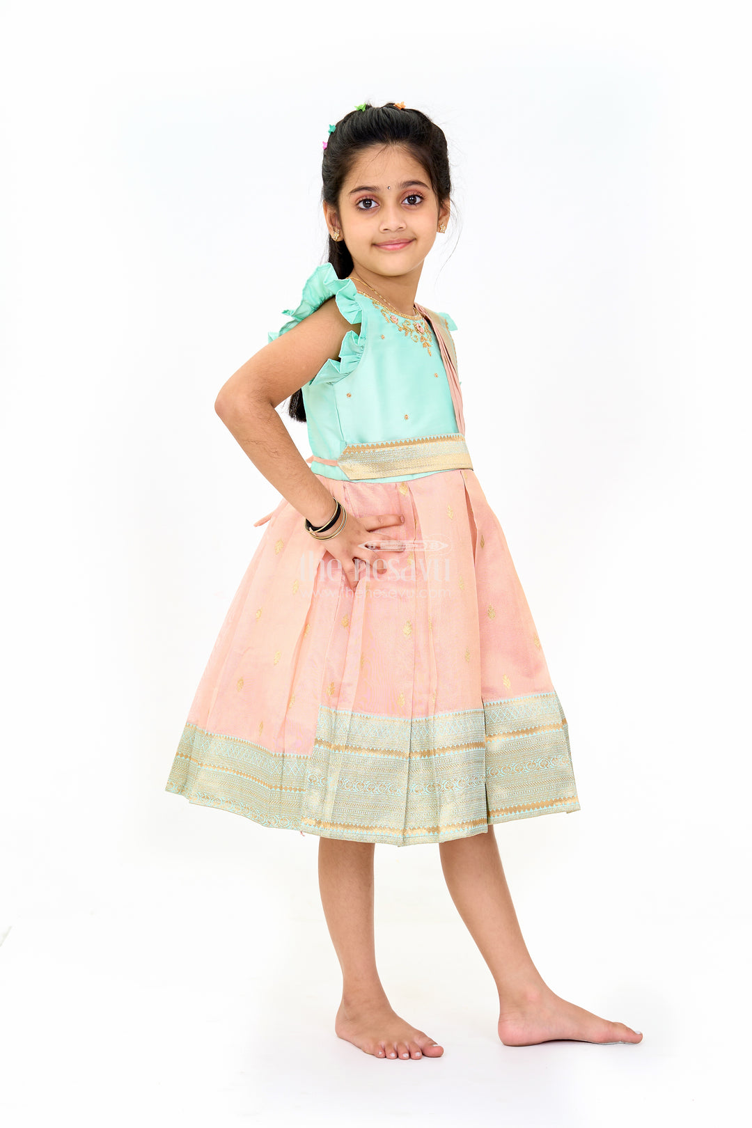 Girls Silk Party Frock with Puff Sleeves and Traditional Border Design