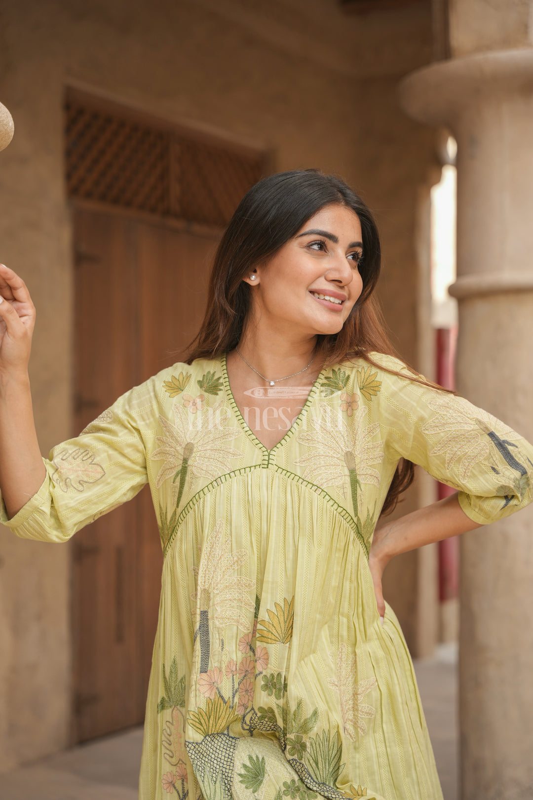 Graceful Women’s Chiffon Flared Kurtha with Subtle Floral Embroidery