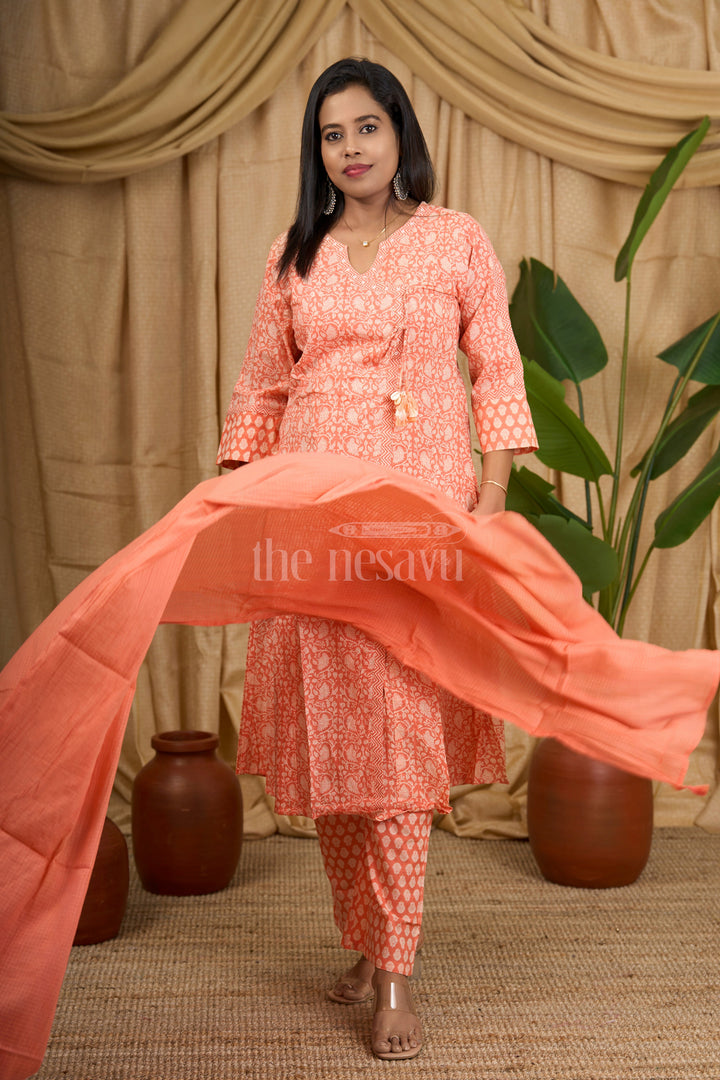 Peach Jaipuri Block Printed Cotton Flared Suit Set with Tassel Detailing on Neckline for Women