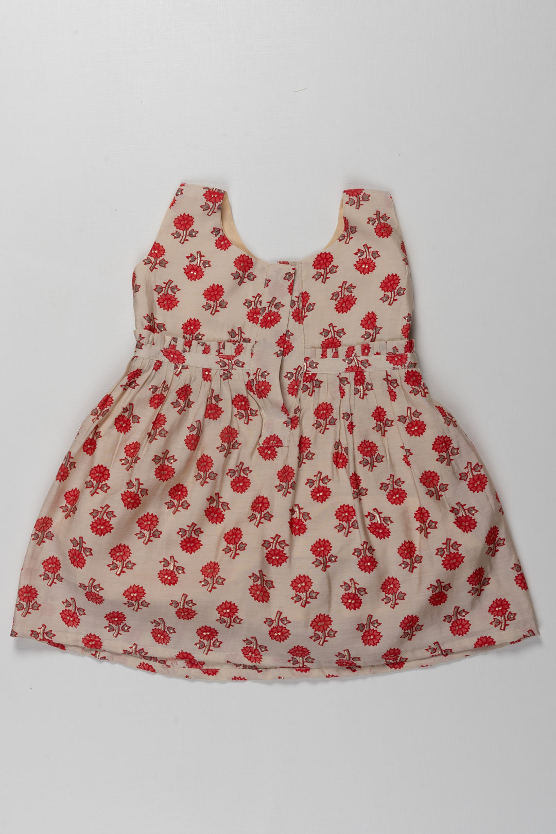 The Nesavu Adorable Cream and Red Floral Cotton Frock for Kids Nesavu Cream and Red Floral Cotton Frock for Kids - Comfortable Daily Wear