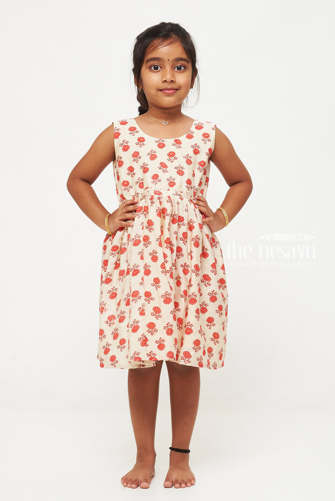 The Nesavu Adorable Cream and Red Floral Cotton Frock for Kids Nesavu Cream and Red Floral Cotton Frock for Kids - Comfortable Daily Wear