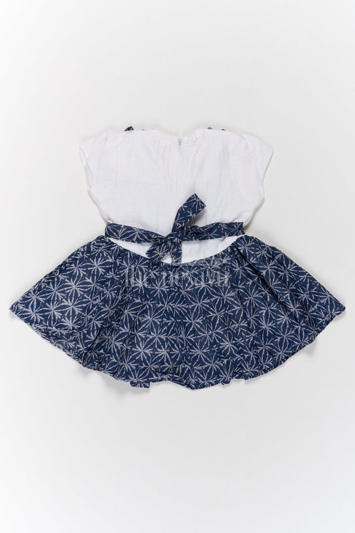 The Nesavu Girls Cotton Frock Adorable Girls Cotton Frock with White Ruffle Top and Navy Blue Floral Printed Skirt Frock Designs for Childrens Nesavu Nesavu Girls Cotton Frock Navy Blue Floral Skirt White Ruffle Top Perfect Frock Designs Childrens