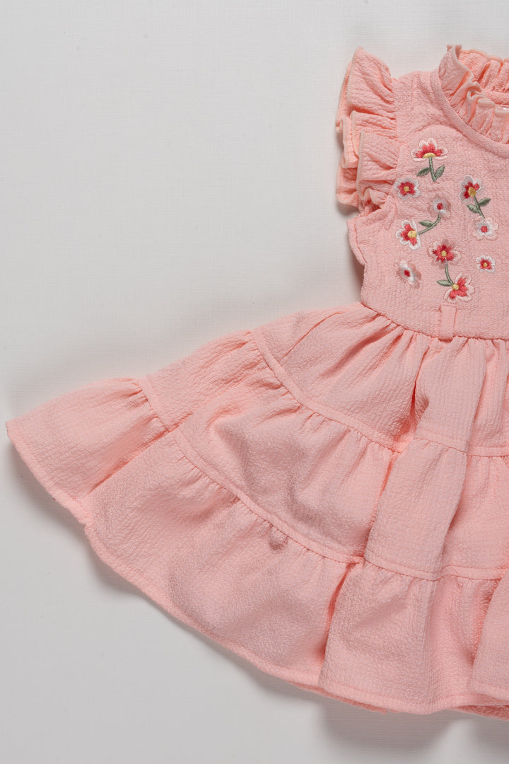 The Nesavu Girls Cotton Frock Adorable Girls Pink Cotton Ruffle Frock with Floral Embroidery Nesavu Adorable Girls Pink Cotton Ruffle Frock with Floral Embroidery | The Nesavu