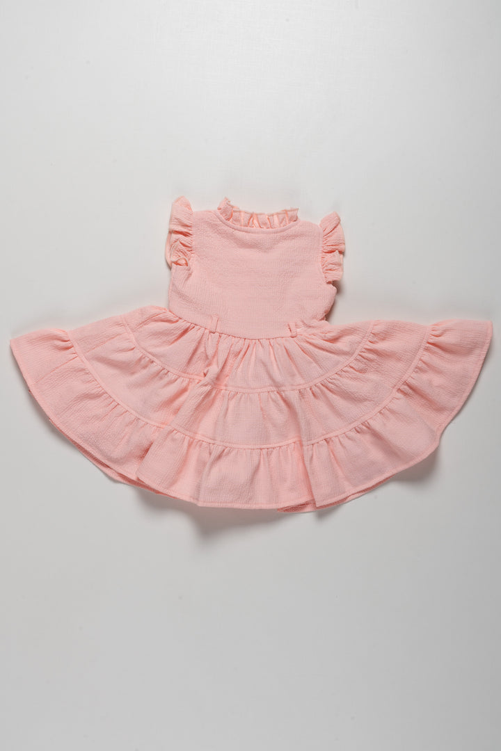 The Nesavu Girls Cotton Frock Adorable Girls Pink Cotton Ruffle Frock with Floral Embroidery Nesavu Adorable Girls Pink Cotton Ruffle Frock with Floral Embroidery | The Nesavu