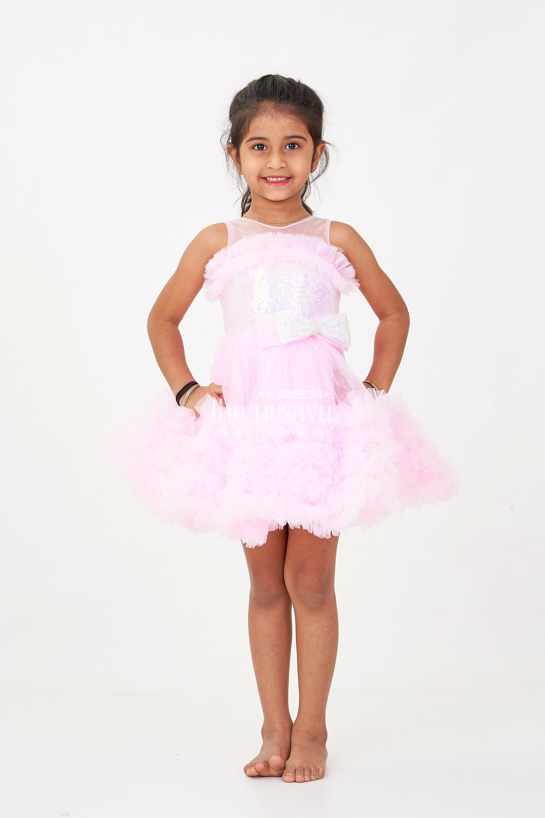 The Nesavu Girls Fancy Party Frock Adorable Pink Net Party Dress for Girls with Ruffled Layers and Sparkling Bow Nesavu Adorable Pink Net Party Dress Girls Ruffles Sparkling Sequin Bow | The Nesavu