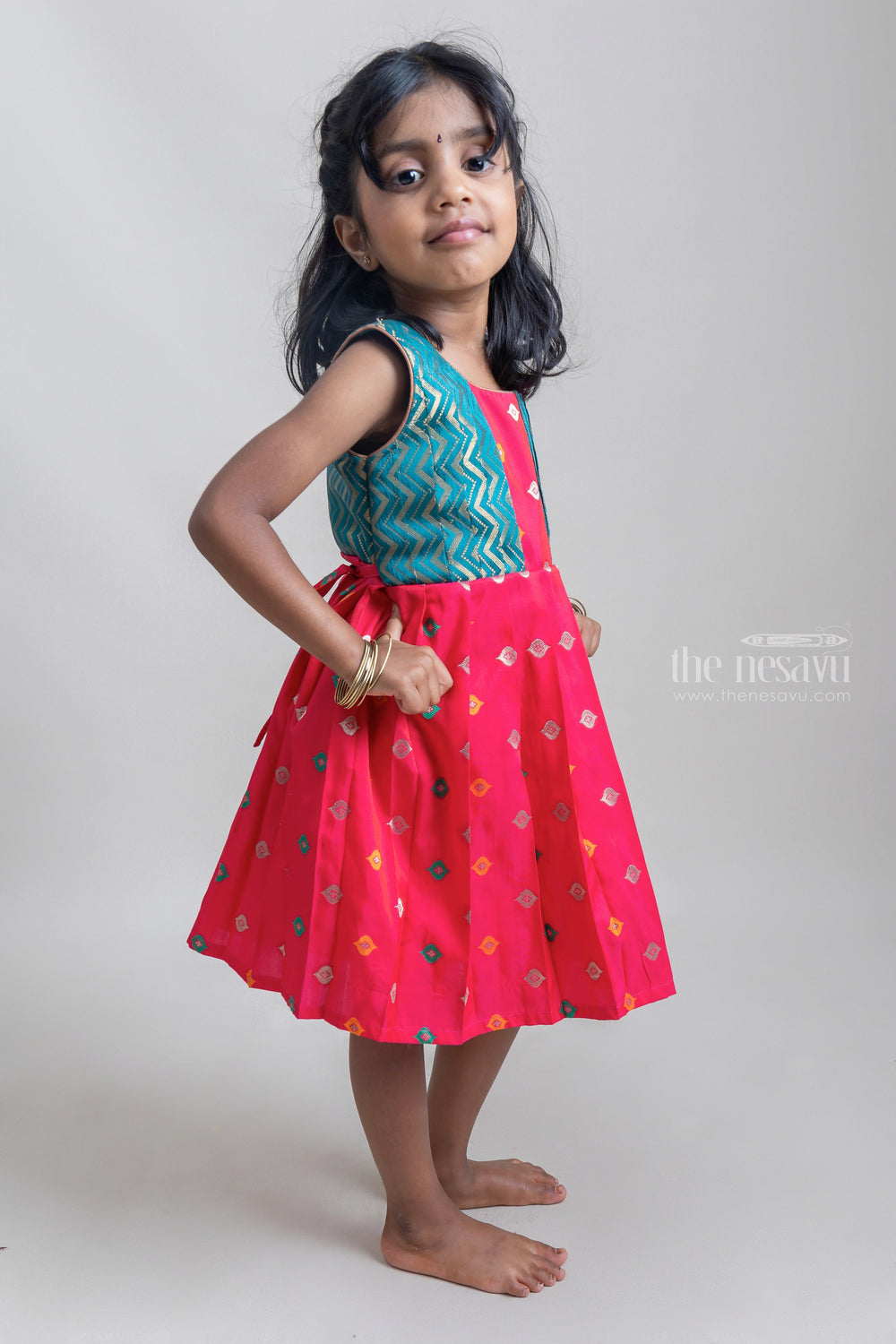 The Nesavu Silk Frock Alluring Green & Deeppink Butta Harmony Pleated Pattu Elegance for Young Fashionistas. Nesavu Pink Semi-silk Frock For Girls | Latest silk wear Collection | The Nesavu