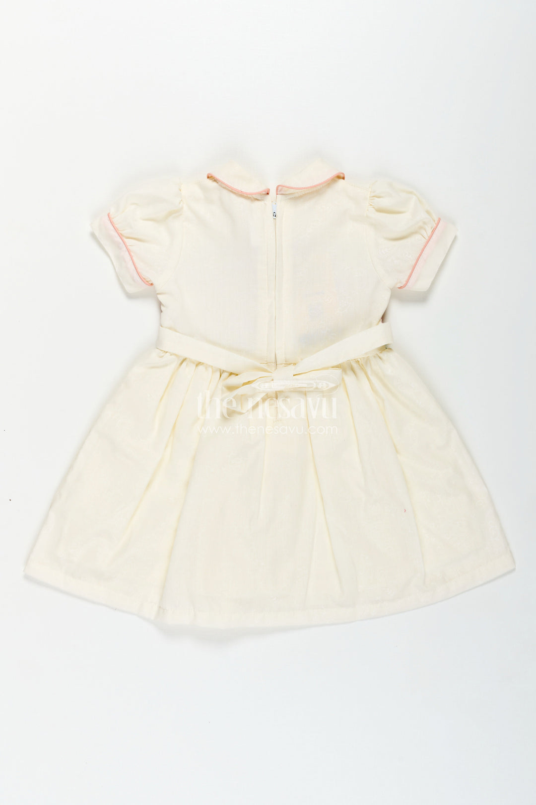 The Nesavu Girls Cotton Frock Archive -Girls Short Frock White Colour with Smocked Rainbow Yoke and Peter Pan Collar in Soft Cotton Blend Nesavu Nesavu Girls Short Frock White Colour Rainbow Smocked Yoke Peter Pan Collar
